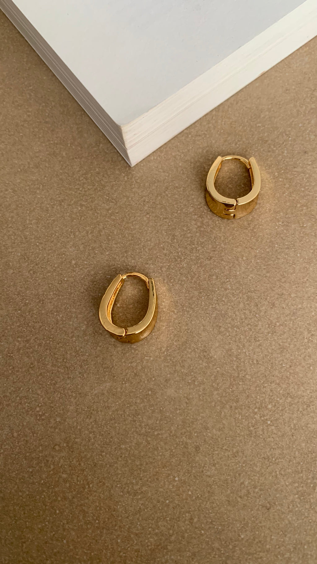 ELLIPTICAL HONEY CURVED  U SHAPED HOOP EARRING
